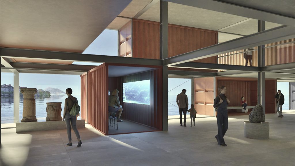 Innenansicht eines modernen Museums in Containern mit großen Fenstern, Metallträgern und als Räume umfunktionierten Schiffscontainern; mehrere Personen gehen, sitzen oder betrachten die Ausstellungen.